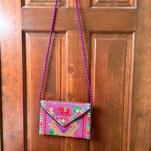 Pretty NWOT vibrant India inspired purse with elephants. Unbranded